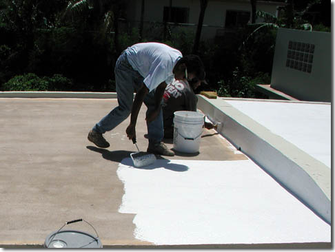 Roofer installing slate roof in Canoga Park, CA.